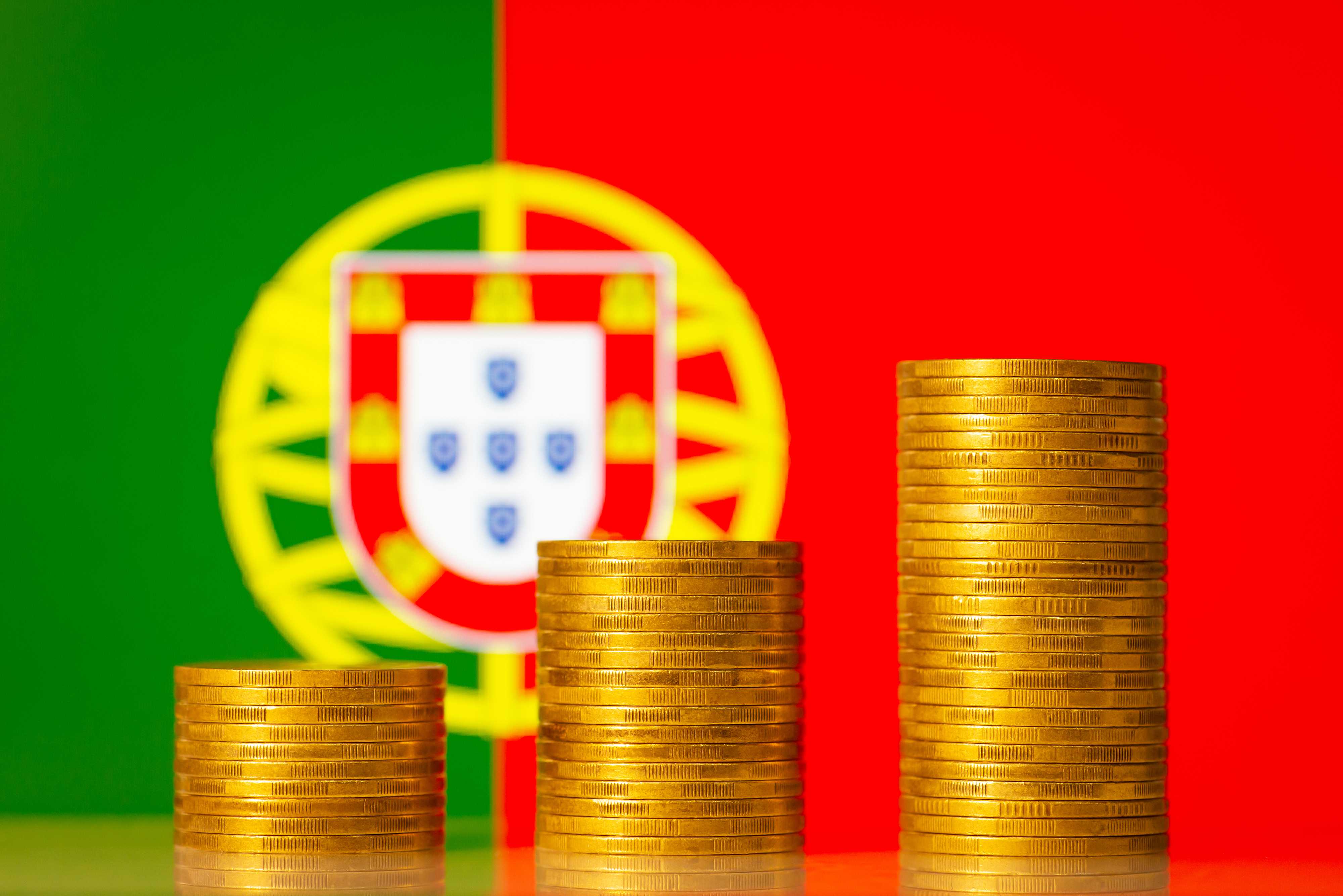 upcoming-money-coin-stacks-background-flag-portugal-concept-development-economy-portugal-financial-profit-gdp-level